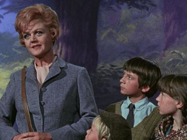 A young woman is with three children against an animated forest backdrop.