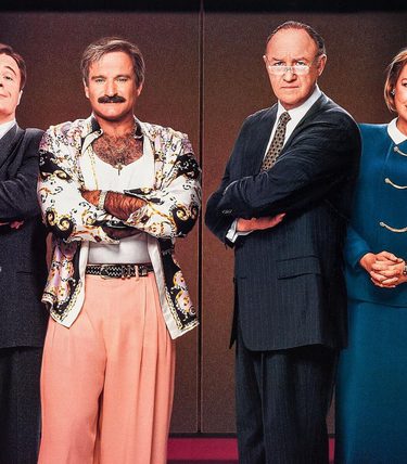 Four people standing in a line with arms crossed - Robin Williams, Nathan Lane, Gene Hackman and Diane Wiest