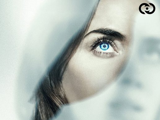 A close-up picture of Emily Blunt with a focus on her eye which is heavily coloured blue. There is a silhouette of a bird over her face.