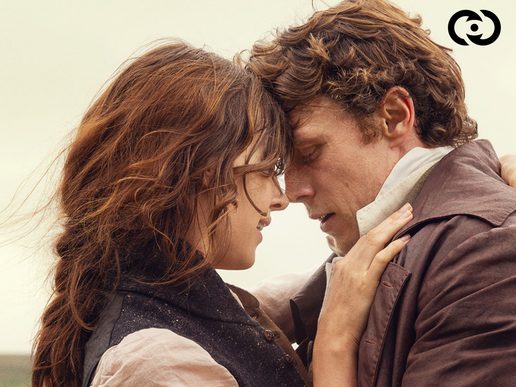 A man and woman are close together about to embrace.