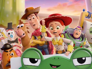 Toy Story Characters Buzz, Woody, Jessie and others are all looking worriedly at a frog Ipad character.