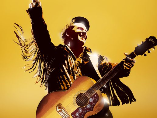 A stylised illustration of a performer dressed like Elvis Presley, raising one arm triumphantly while playing an acoustic guitar, set against a bright golden-yellow background.