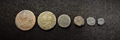A variety of Roman coins found at the Edburton excavation scaled
