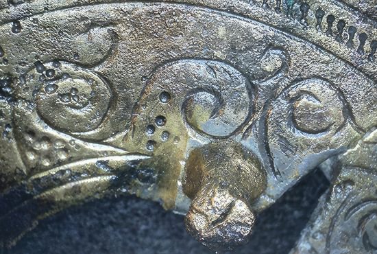 close up of detail square brooch